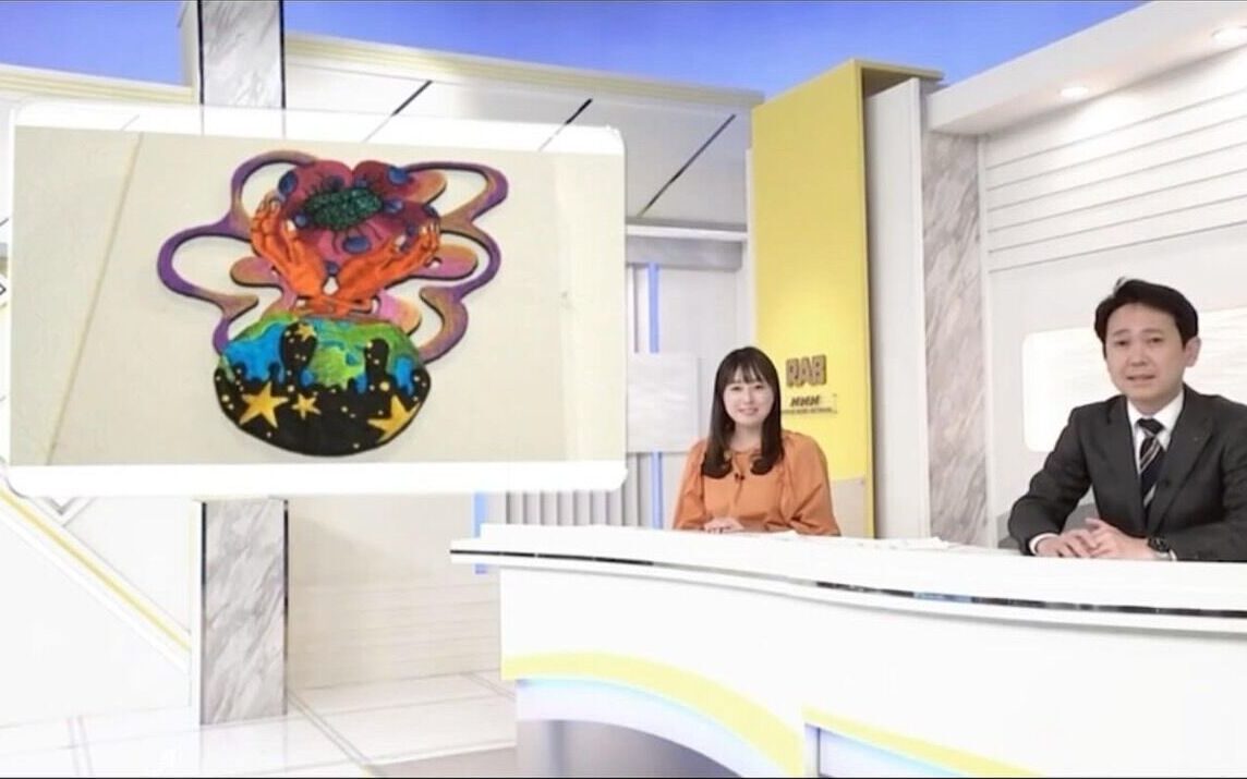 TV studio appearance, embroidered work introduced on a morning program (press)